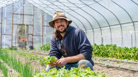 Farmer Matt in greenhouse at Old Soul Farm in Barre