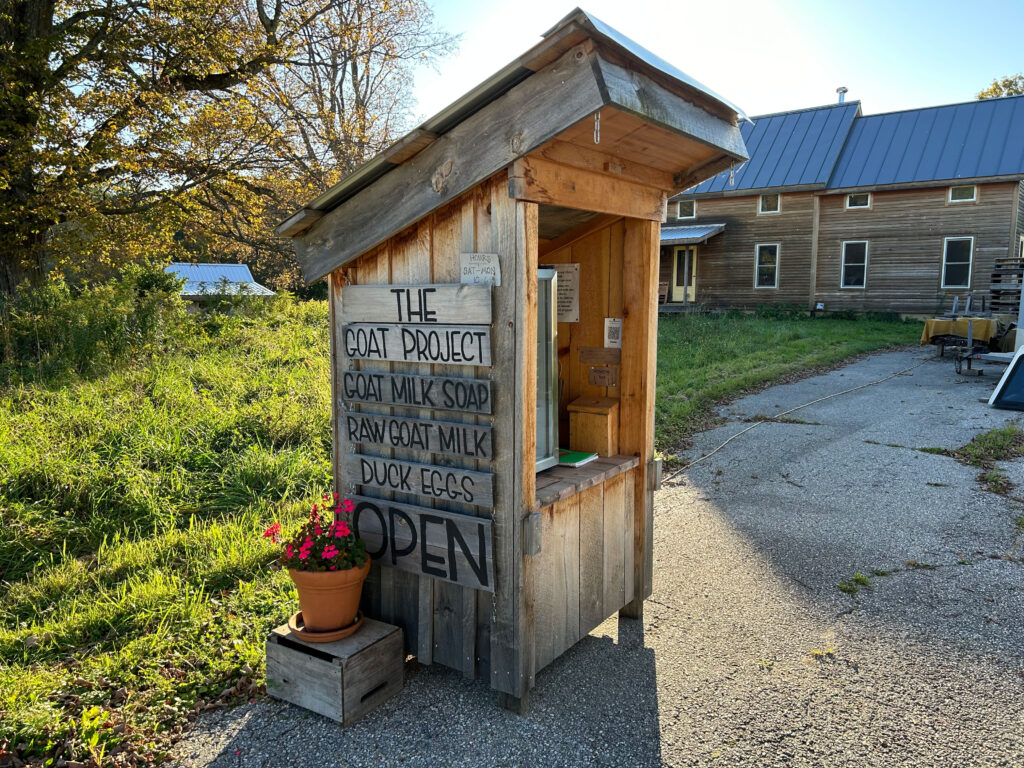 small wood farmstand with the label "The Goat Project". Bennington Vermont