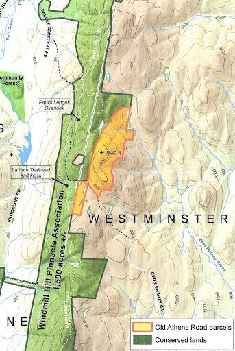 Topographic map of western edge of Westminster Vermont, showing conserved lands (in green) along mountain summits and latest addition (in yellow).