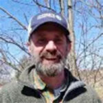 pic of man wearing hat