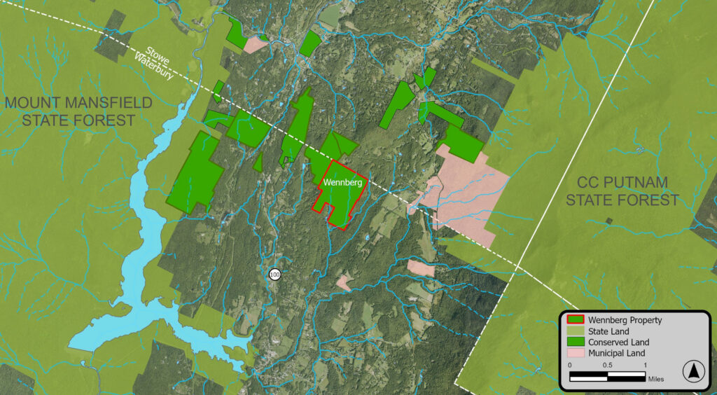 map showing towns of Stowe and Waterbury in Vermont with green highlights for land protected for wildlife