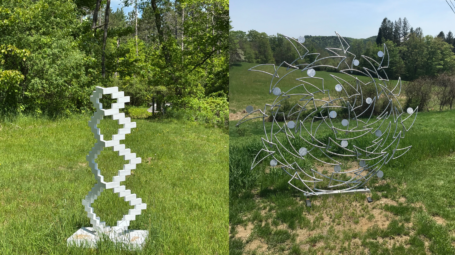 Two sculptures are depicted in separate images. Both are set in a green meadow.